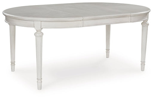 Montelaine Dining Extension Table - Couch Potato Furniture & Mattress (CA) - Multi Location